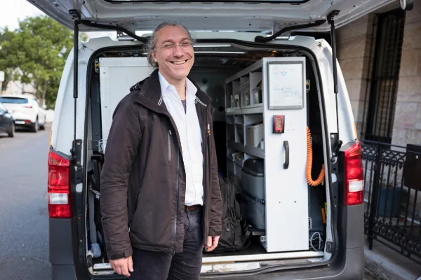 Sydney mobile vet standing next to his mobile pet dispensary
